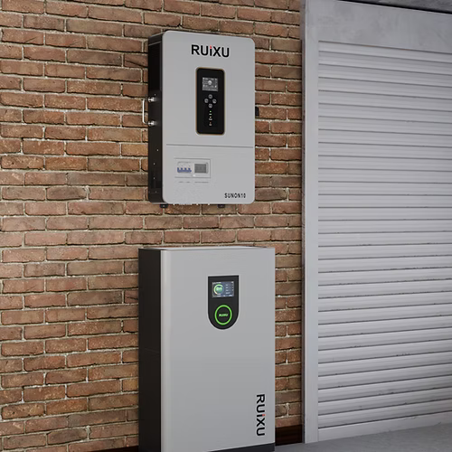 Two RUIXU inverters mounted on a brick wall with a white shutter.